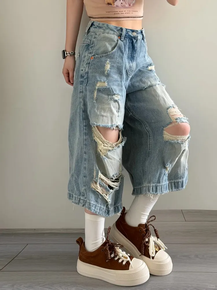 Brown platform sneakers with big head doll design