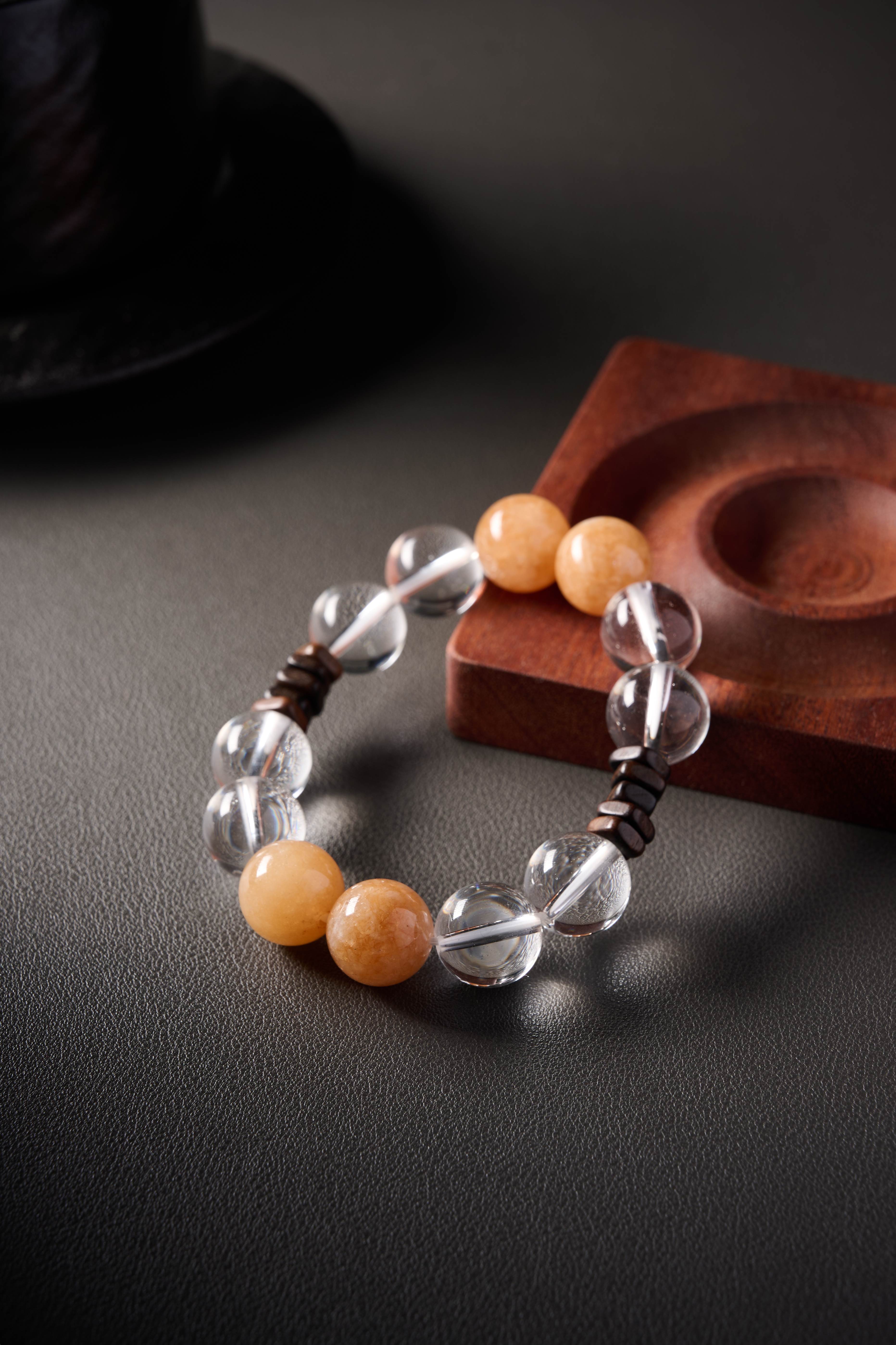 Texture highlight – contrast between clear quartz transparency and warm yellow jade glow.