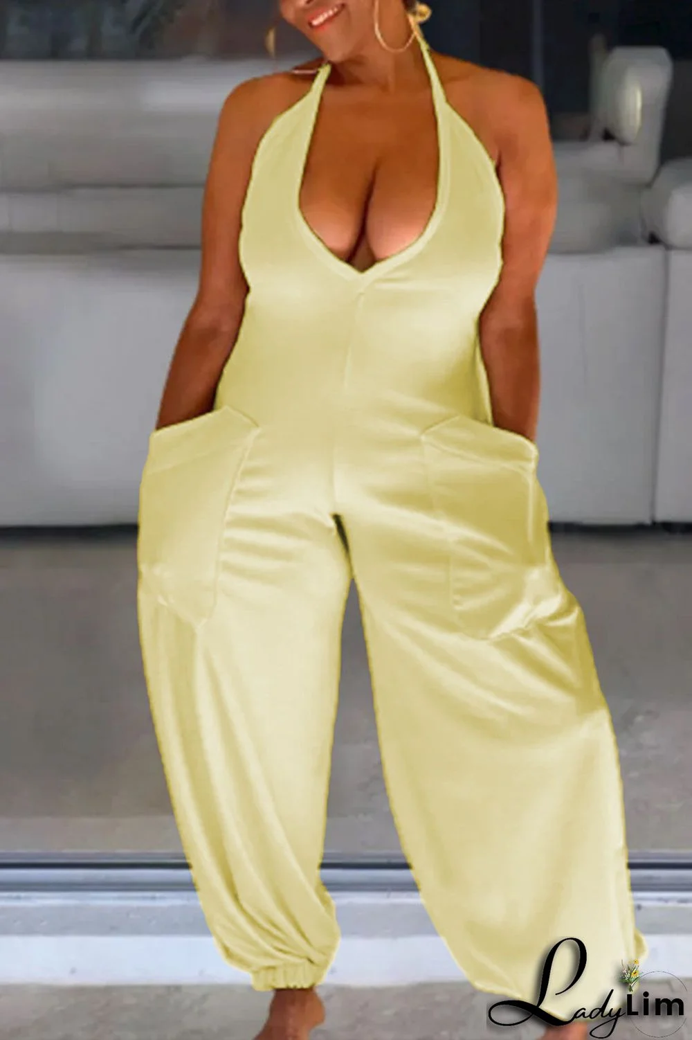 Yellow Fashion Sexy Solid Bandage Patchwork Backless Halter Regular Jumpsuits