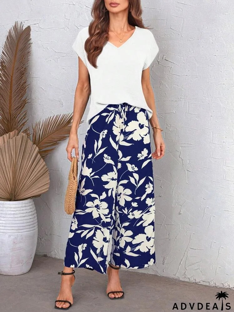 Women's Summer Solid Color V-Neck Batwing Short Sleeve Top And Floral Printed Wide-Leg Loose Pants Set