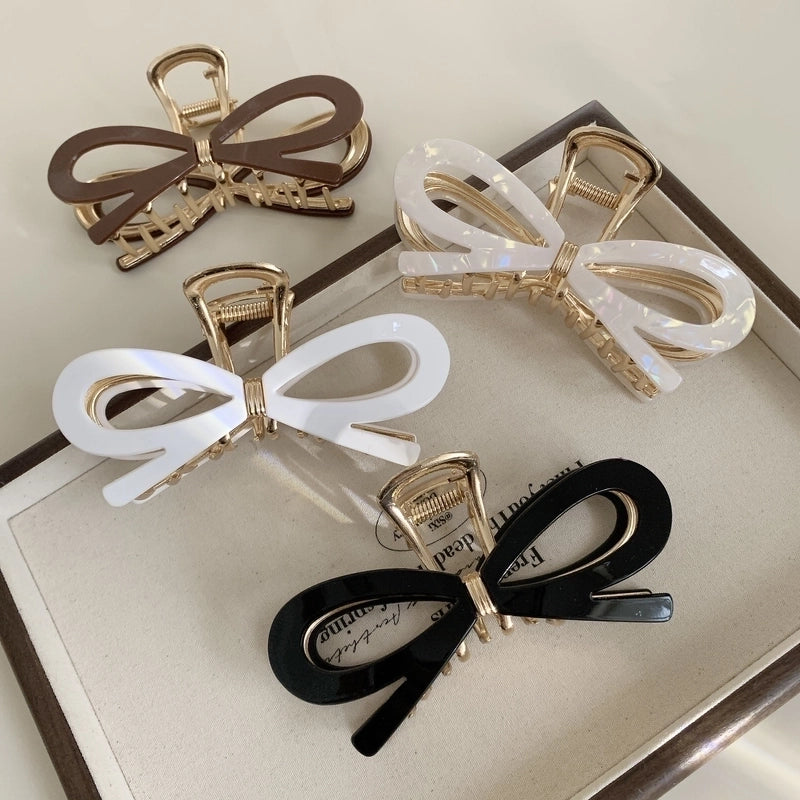 Women’s Classic Style Bow Knot Acetic Acid Sheets Metal Criss Cross Hair Claws
