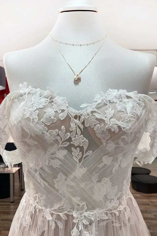 A-line Wedding Dress with Appliques and Off The Shoulder Long Sleeves main image 0