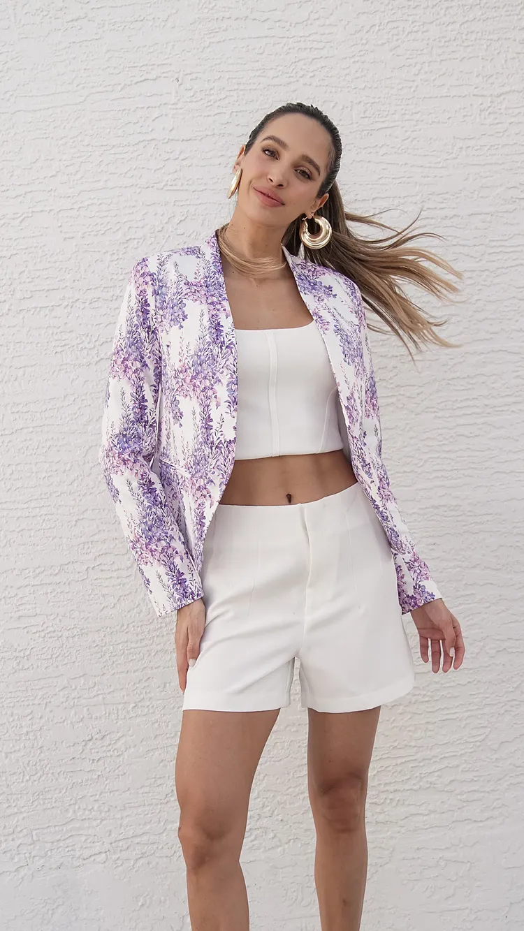 The delicate blooms dance across the fabric on Jackets