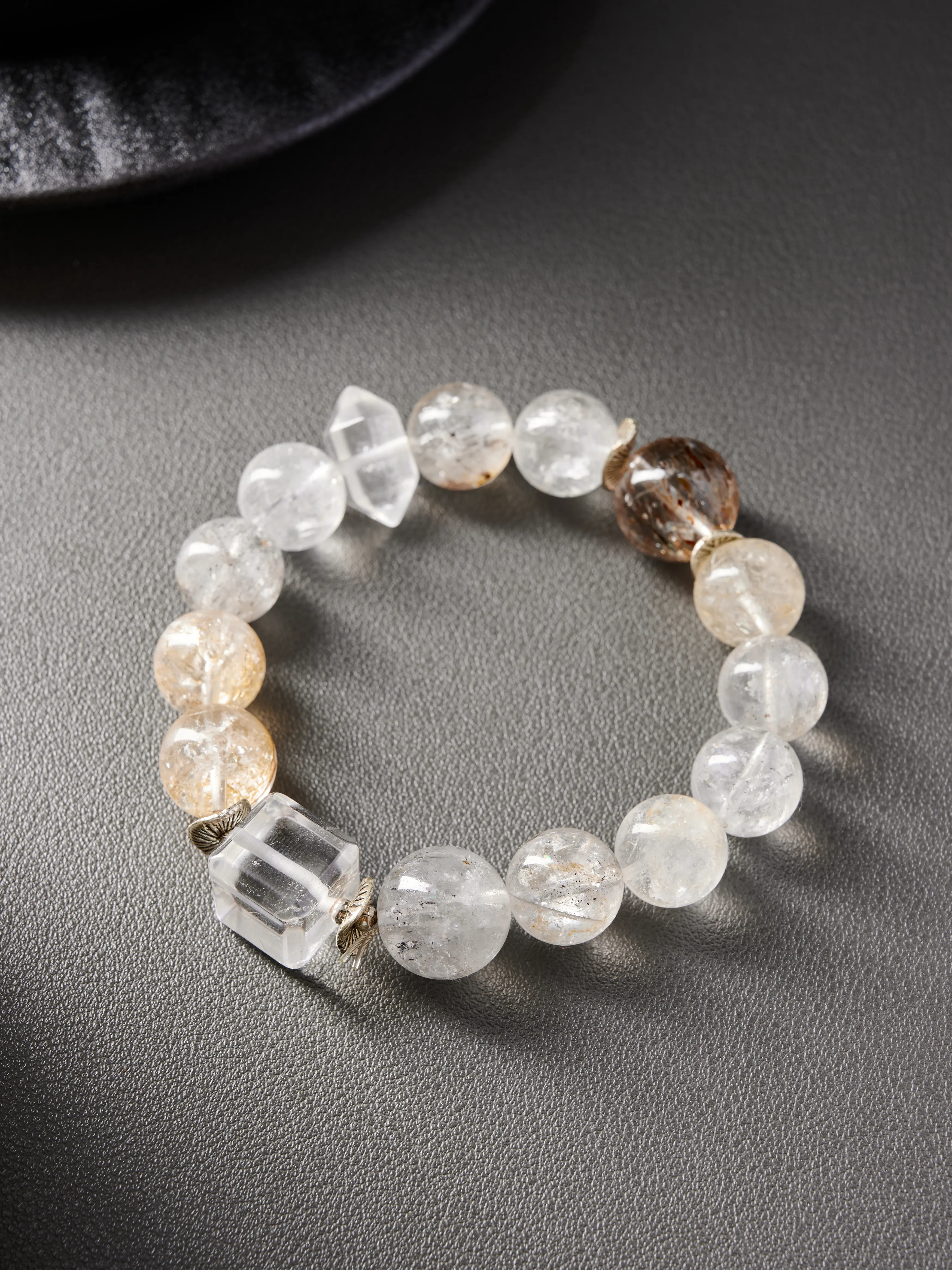 Angle view – full bracelet circle, evenly matched beads on elastic cord, handmade crystal jewelry.