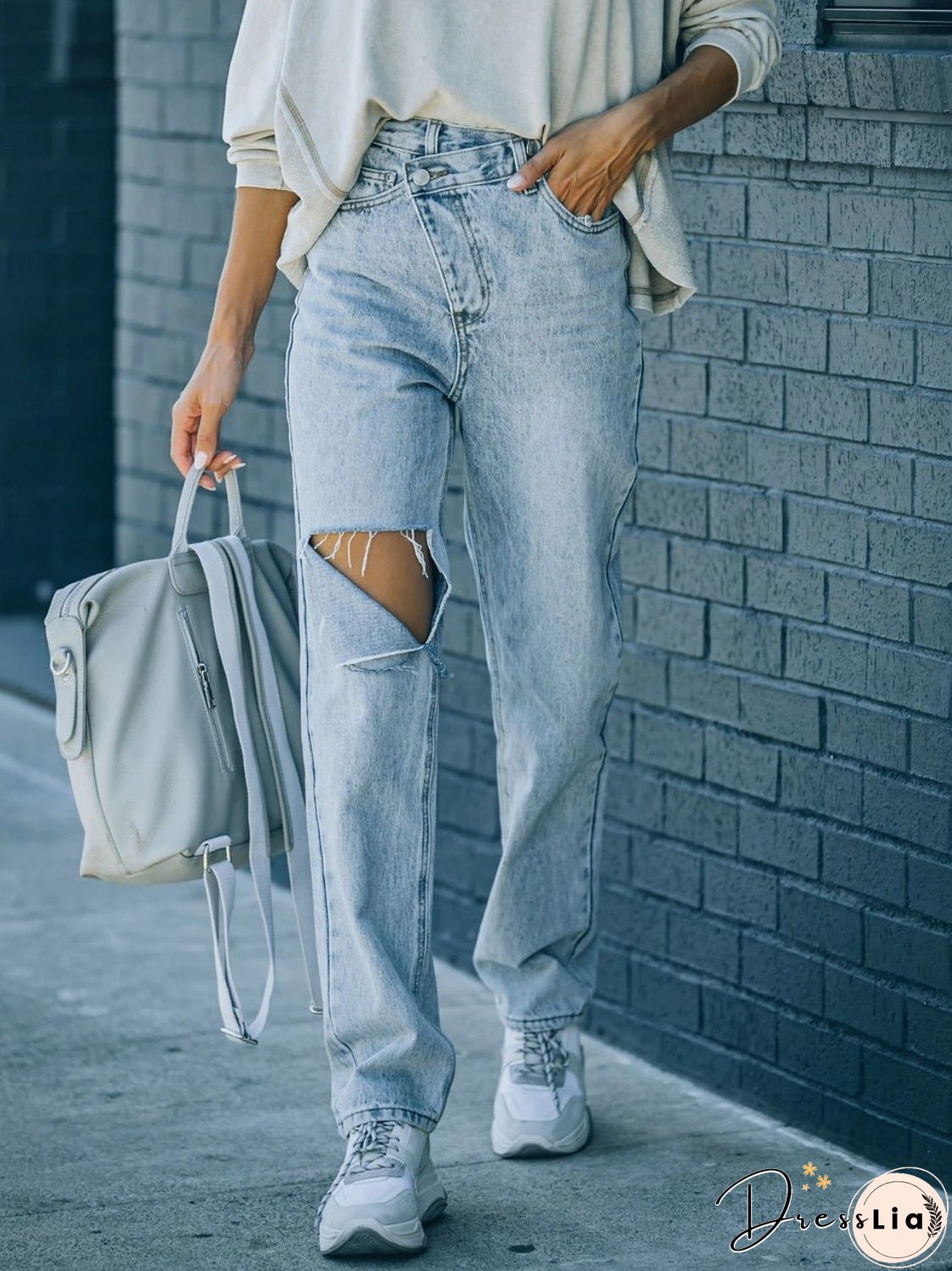 Distressed Asymmetric Waist Jeans