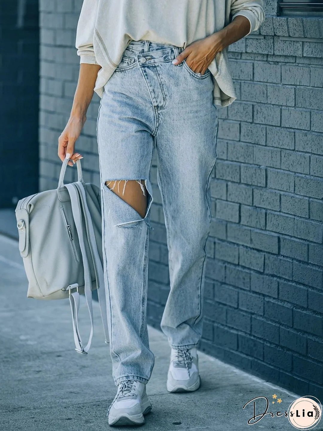 Distressed Asymmetric Waist Jeans