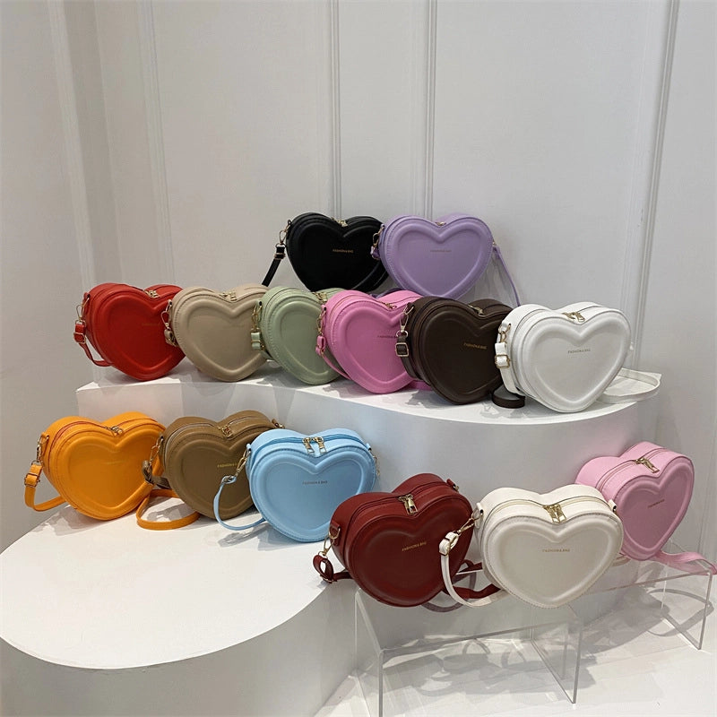 Women's Pu Leather Solid Color Cute Sewing Thread Heart-shaped Zipper Crossbody Bag