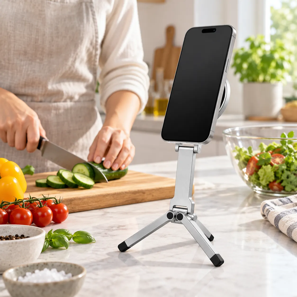 Magnetic phone tripod used for hands-free cooking guidance