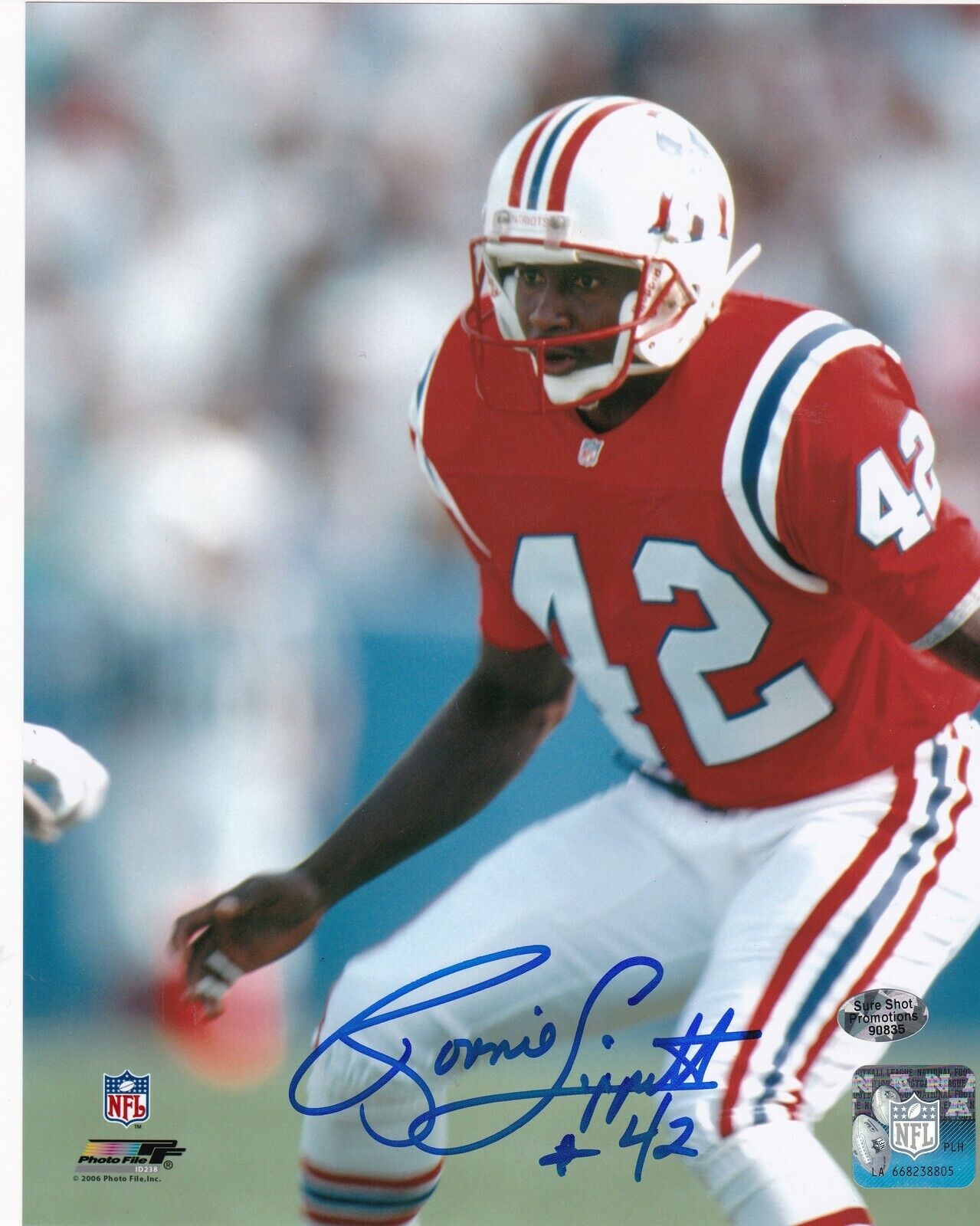 RONNIE LIPPETT NEW ENGLAND PATRIOTS ACTION SIGNED 8x10