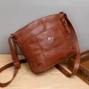 Sac &agrave; bandouli&egrave;re en cuir souple &agrave; pochettes multiples