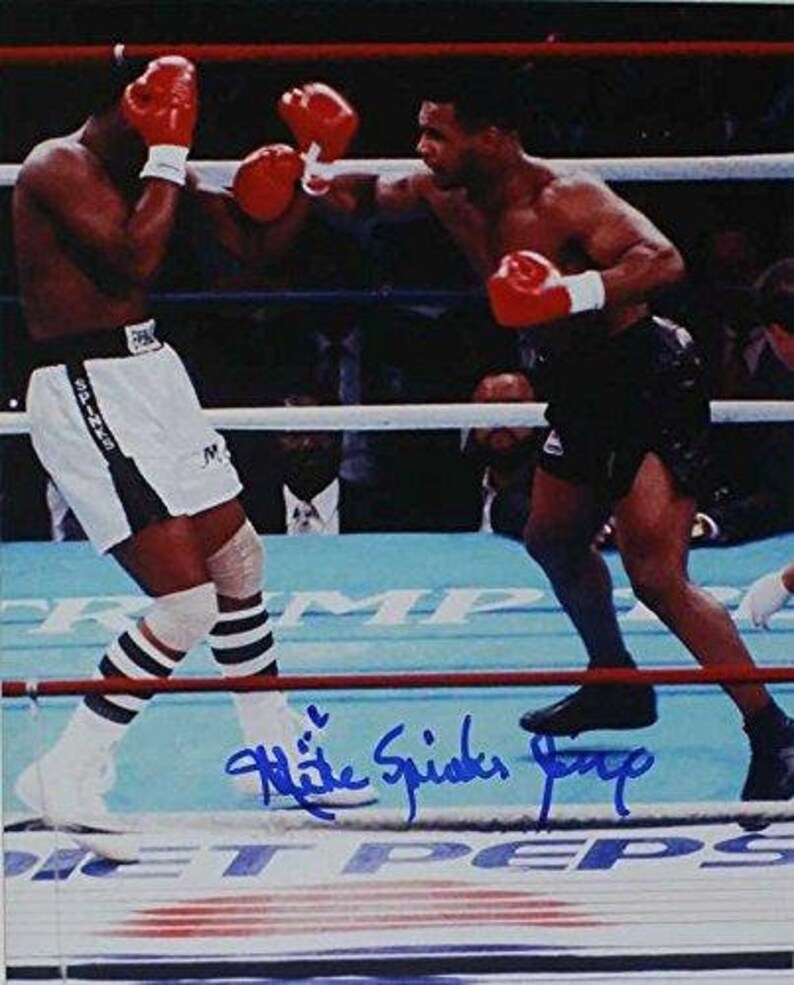 Michael Spinks Signed Autographed Glossy 8x10 Photo Poster painting - COA Matching Holograms