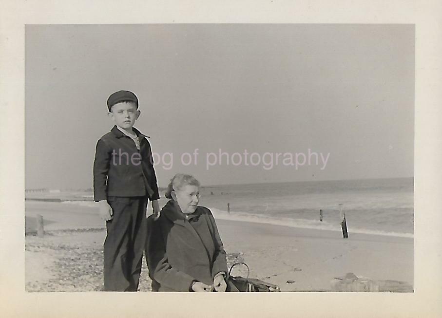 1940's Boy FOUND Photo Poster painting bw AT THE BEACH WITH GRANDMA Original Snapshot 19 7 N