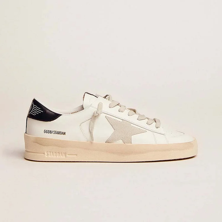Golden Goose Stardan Hombre con estrella de ante gris hielo y refuerzo del talón azul