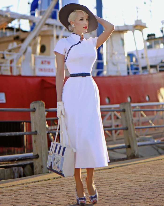 Slanted shoulder buttoned hip dress