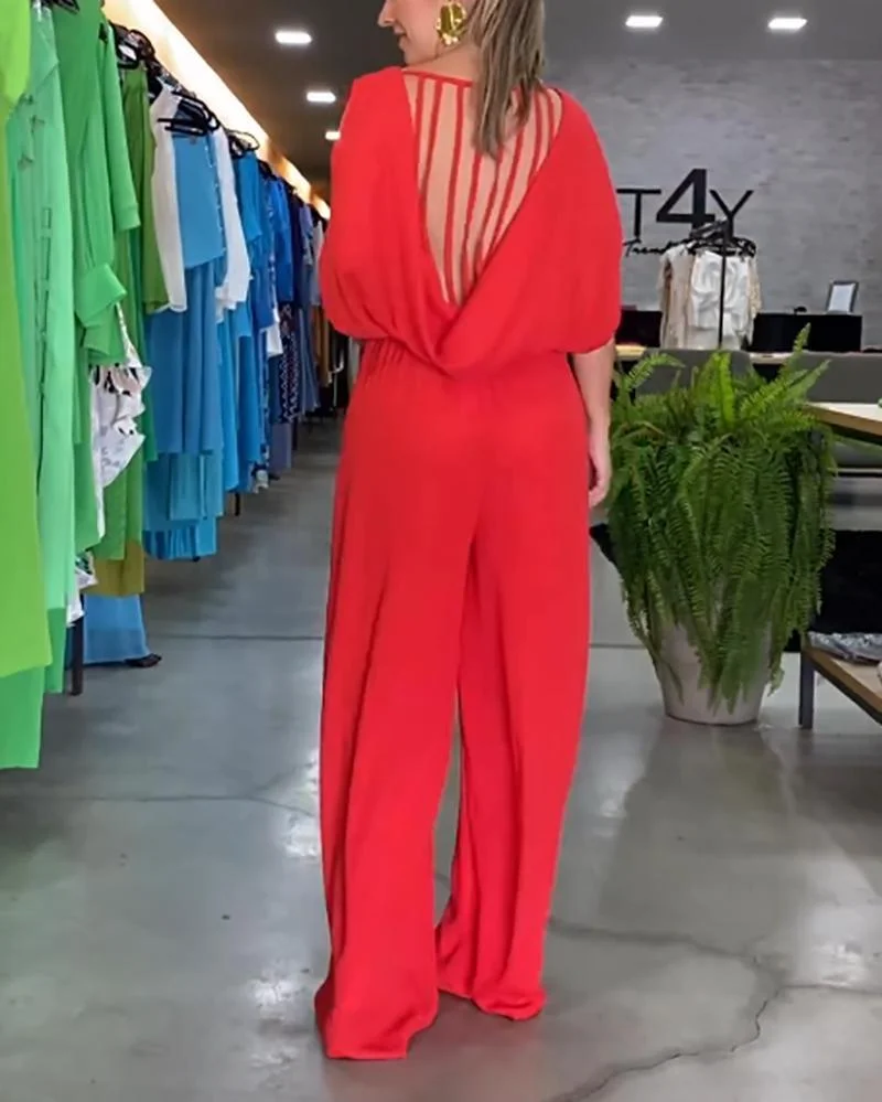 Solid color sleeveless jumpsuit with tassels on the back