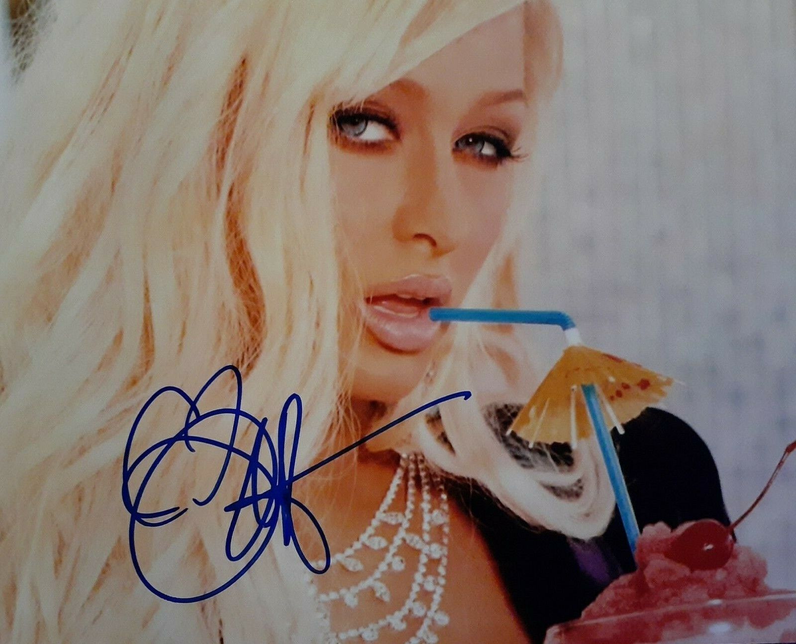 Paris Hilton signed 8x10