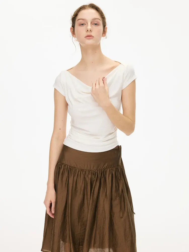White pleated off-shoulder top with short sleeves