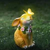 Statue de jardin lapin avec lumi&egrave;re solaire papillon