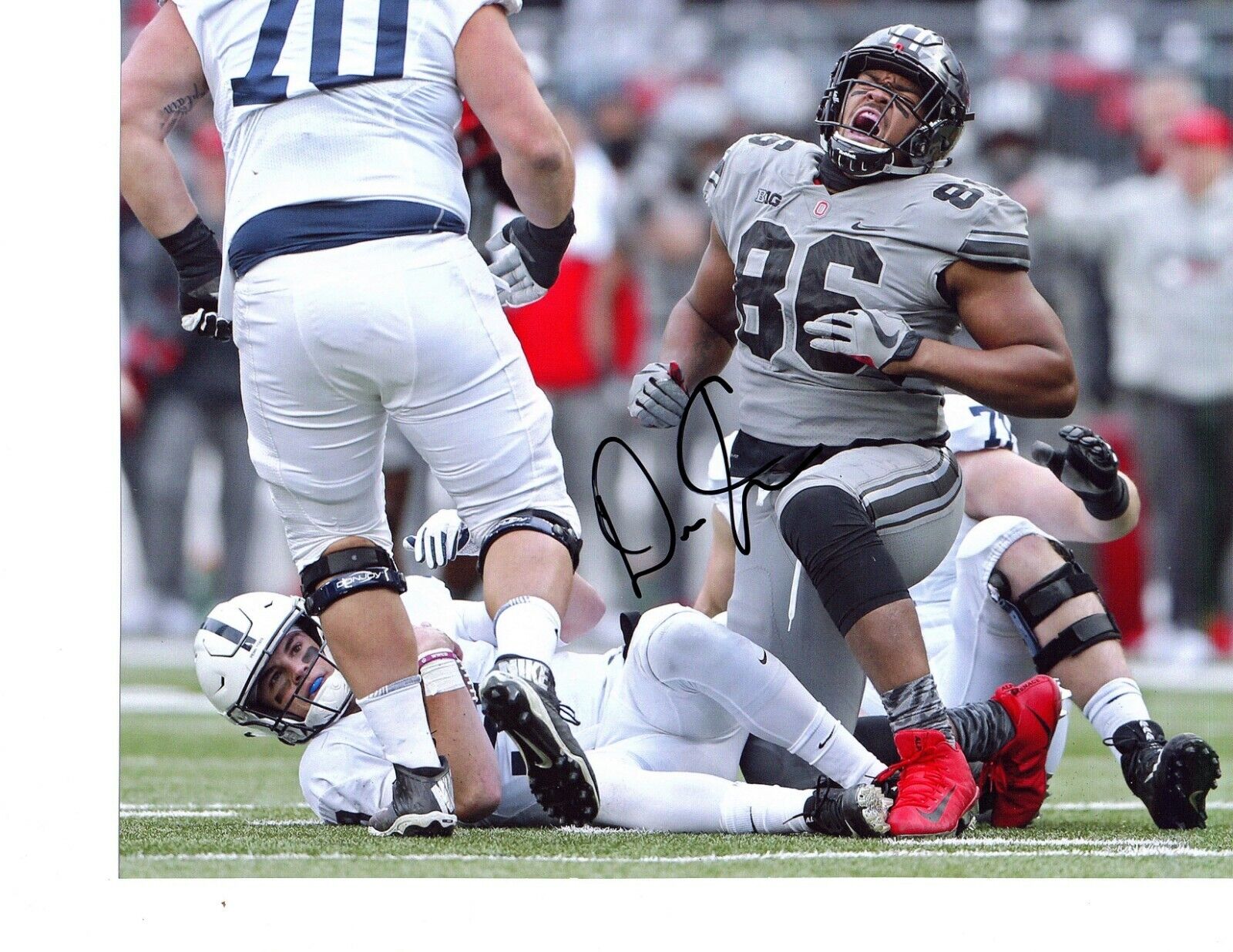 Dre'Mont Jones Ohio State Buckeyes signed autographed 8x10 football Photo Poster painting!