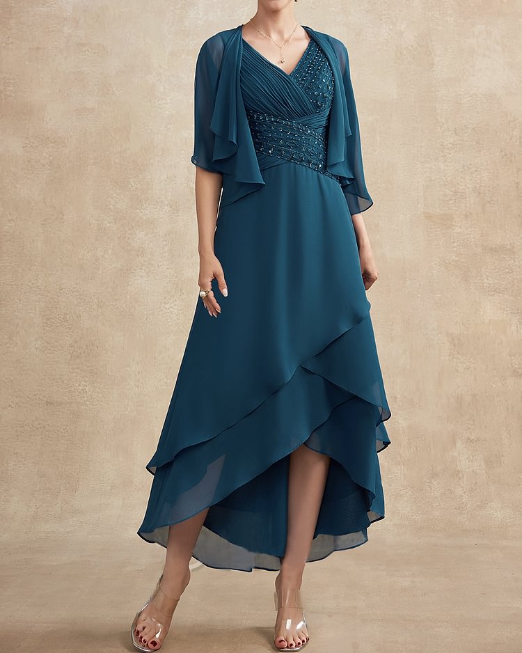 Elegant and dignified ruffled cape dress