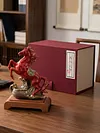 Ceramic horse statue a Chinese feng shui red horse ornament symbolizing good fortune in the Year of