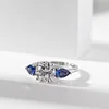 18K White Gold Round Lab Diamond Pear Sapphire Three Stone Ring