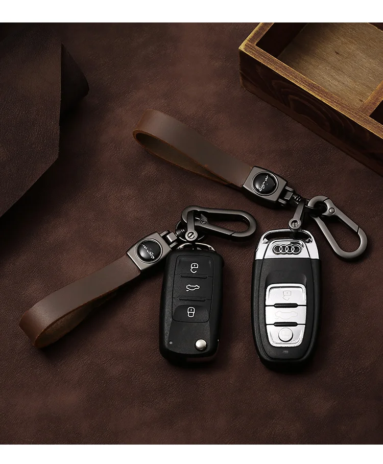 🔥Hot sale🔥Exclusive logo🔥Car anti-lost genuine leather alloy keychain