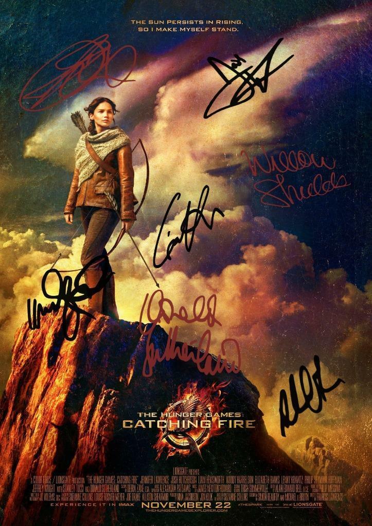 The Hunger Games : Catching Fire CASTX7 PP SIGNED 12 X 8