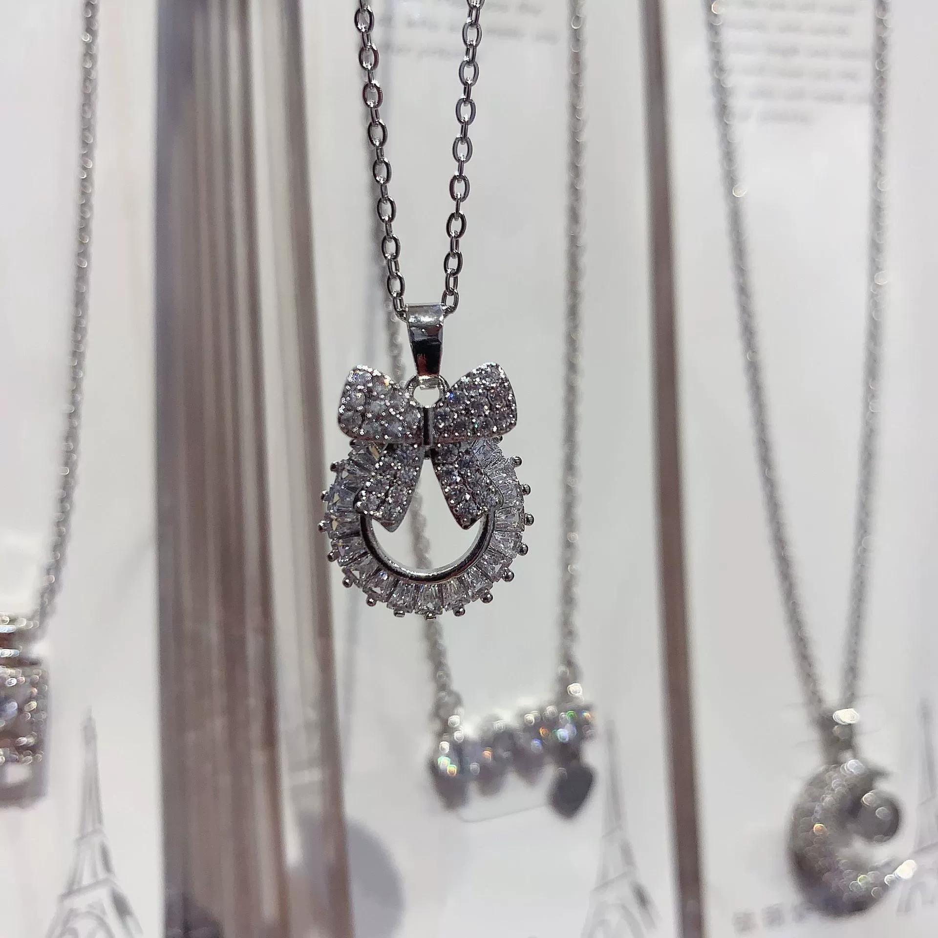 Bow + Round T Zirconia Necklace