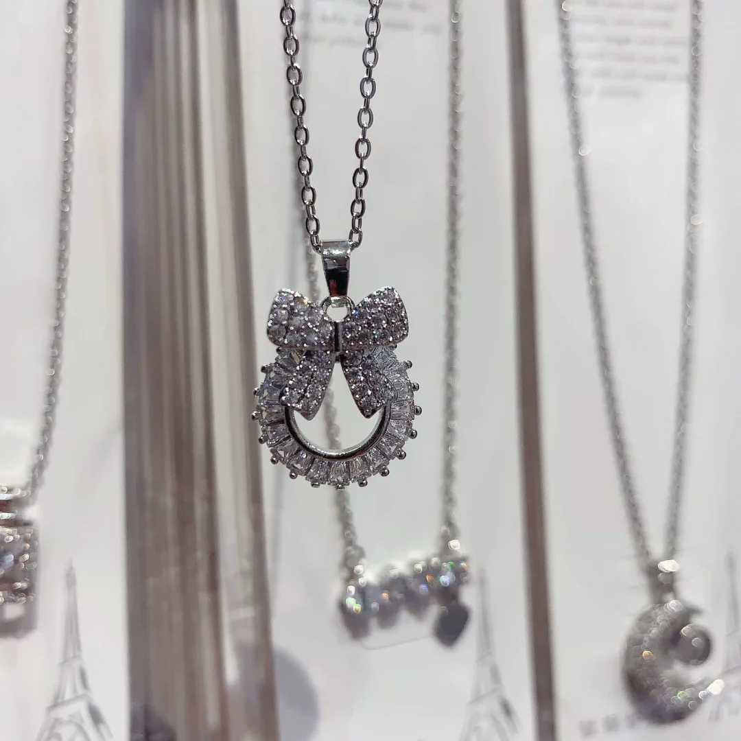 Bow + Round T Zirconia Necklace