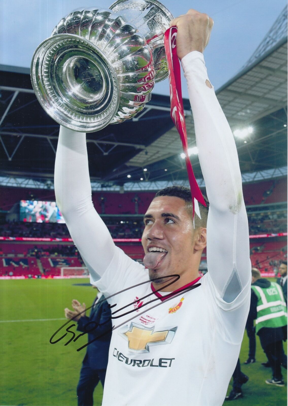 MANCHESTER UNITED HAND SIGNED CHRIS SMALLING 12X8 Photo Poster painting.