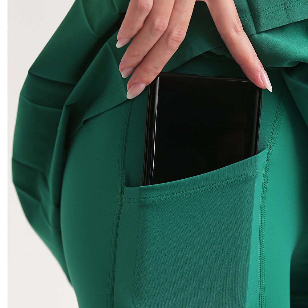 Buy Green women's pleated sports tennis skirt with lining lycra pockets shorts of high quality on Hergymclothing