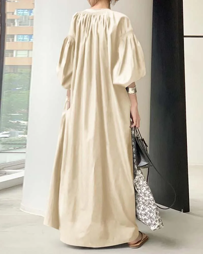 Loose dress with balloon sleeves