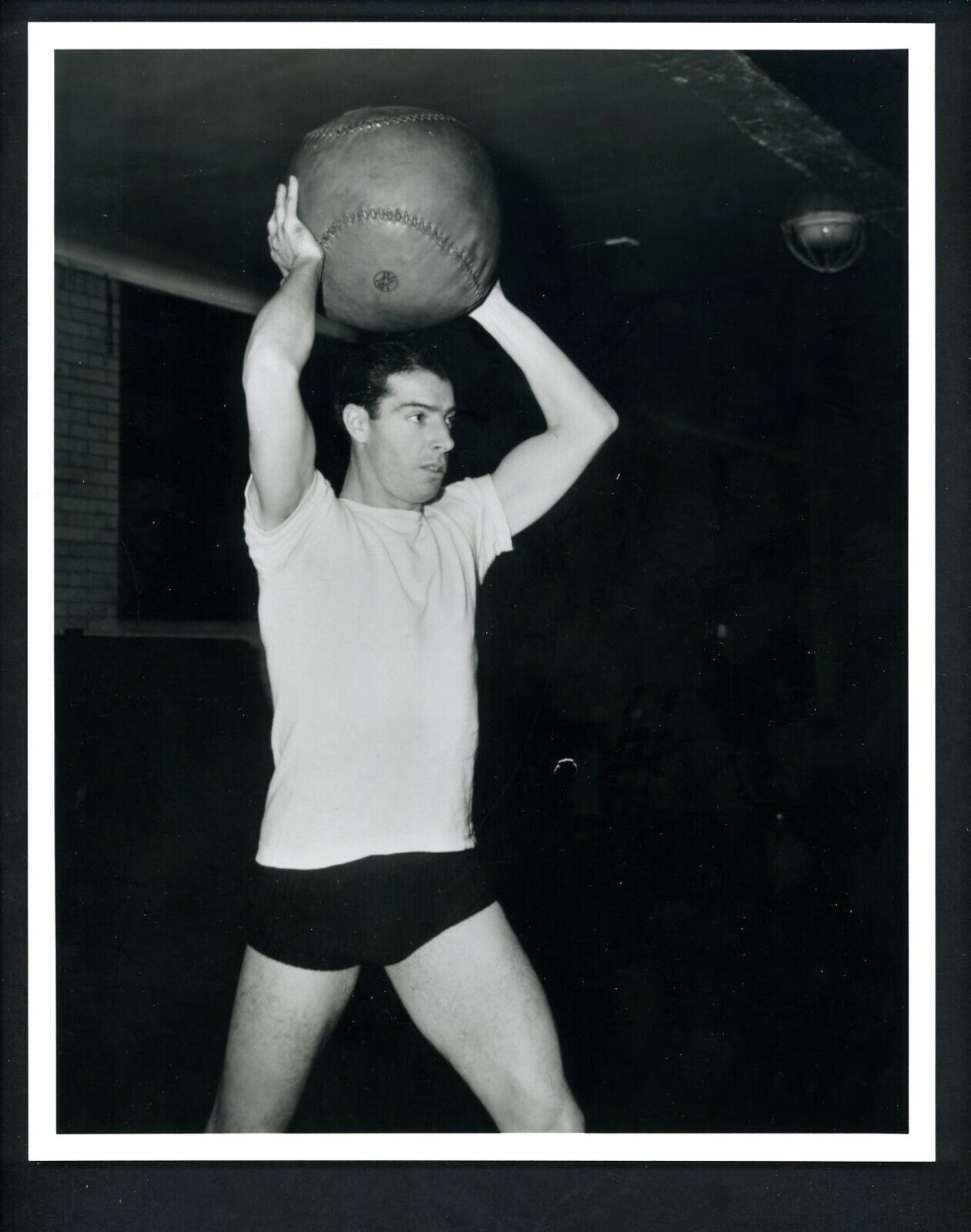 Joe DiMaggio medicine ball workout 1940's Type IV Press Photo Poster painting New York Yankees