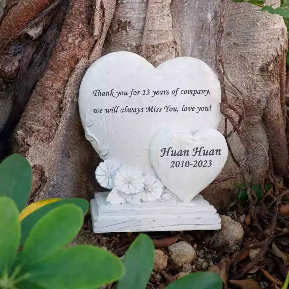 Honor the memory of your beloved companion with our Heart Shaped Custom Pet Memorial Stone. Crafted from durable resin with a realistic stone-like texture, this unique grave marker combines the symbolism of eternal love with the natural beauty of rock. Fully personalizable with laser engraving, you can include your pet's name, dates, and a heartfelt message on this beautiful heart-shaped memorial. Weather-resistant and suitable for both outdoor garden use and indoor display, this pet memorial stone offers a comforting way to keep their spirit close. Whether placed in a backyard, pet cemetery, or favorite resting spot, it serves as a lasting tribute to the love you shared.