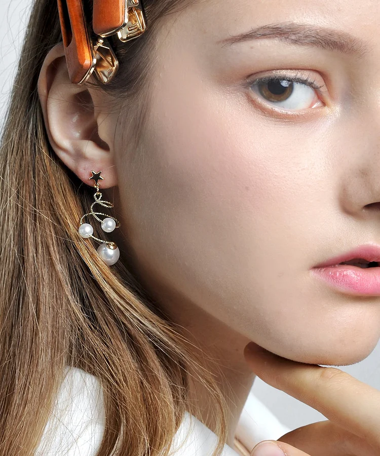Vogue White Copper Pearl Star Screw Drop Earrings