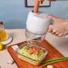 Gatling vegetable cutter new multi-function household slicing artifact Storm electric garlic pounder food supplement handheld cooking machine