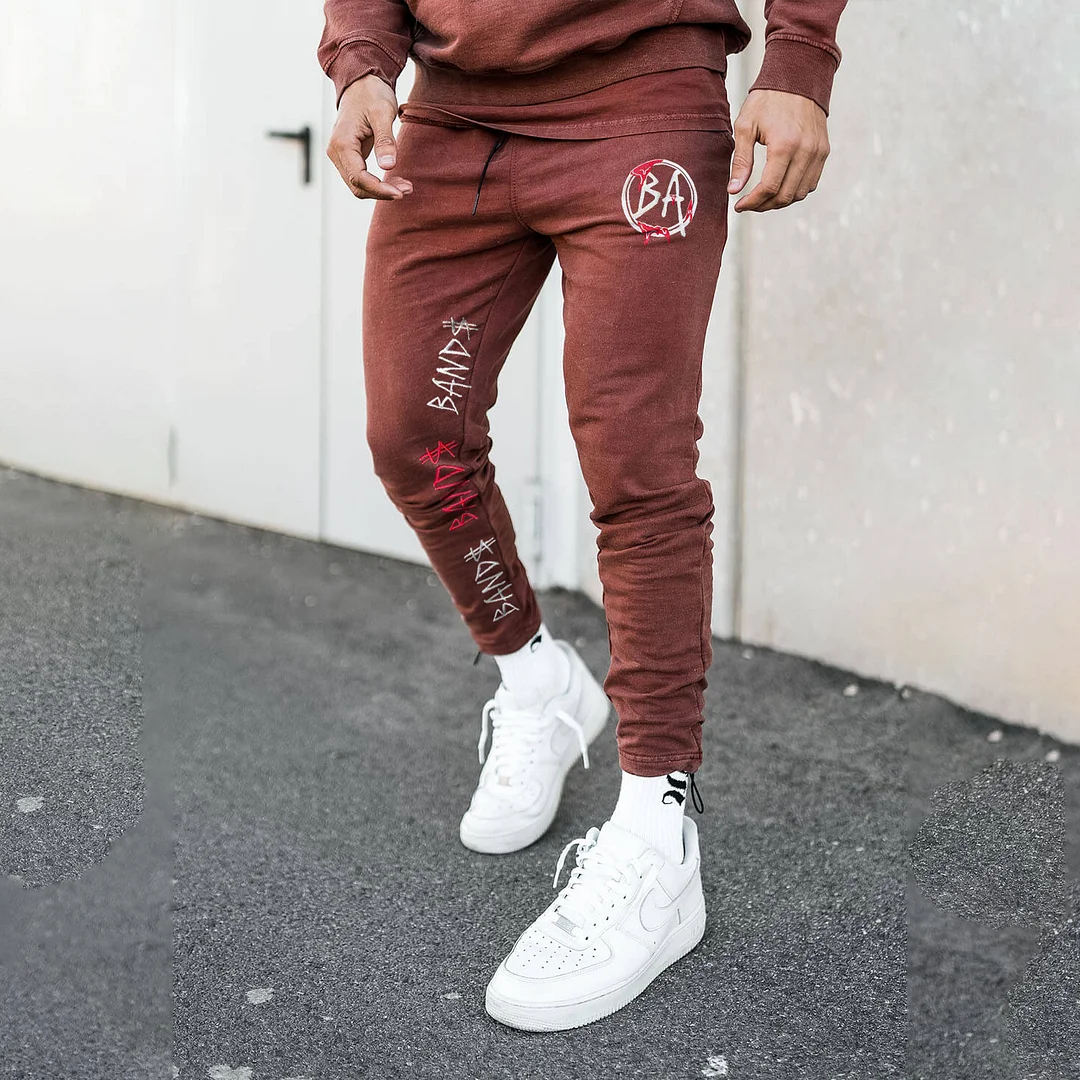 Street-inspired monogrammed track trousers