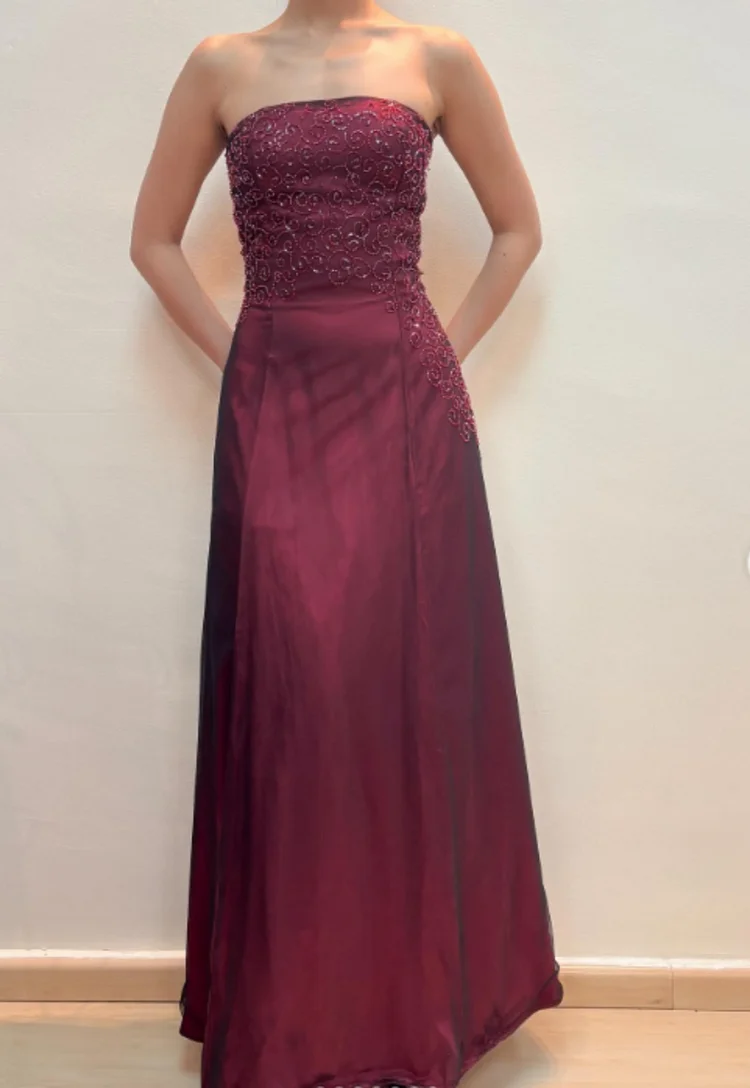 A simple yet elegant red mesh beaded strapless dress, a beautiful gown.
