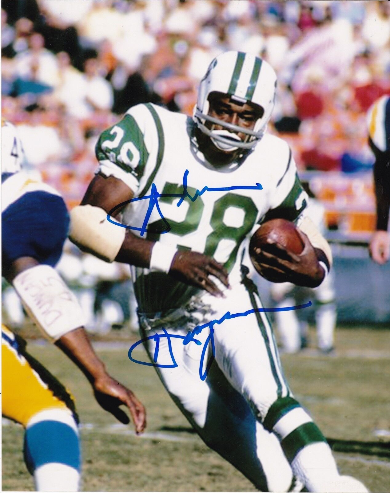 ABNER HAYNES NEW YORK JETS ACTION SIGNED 8x10