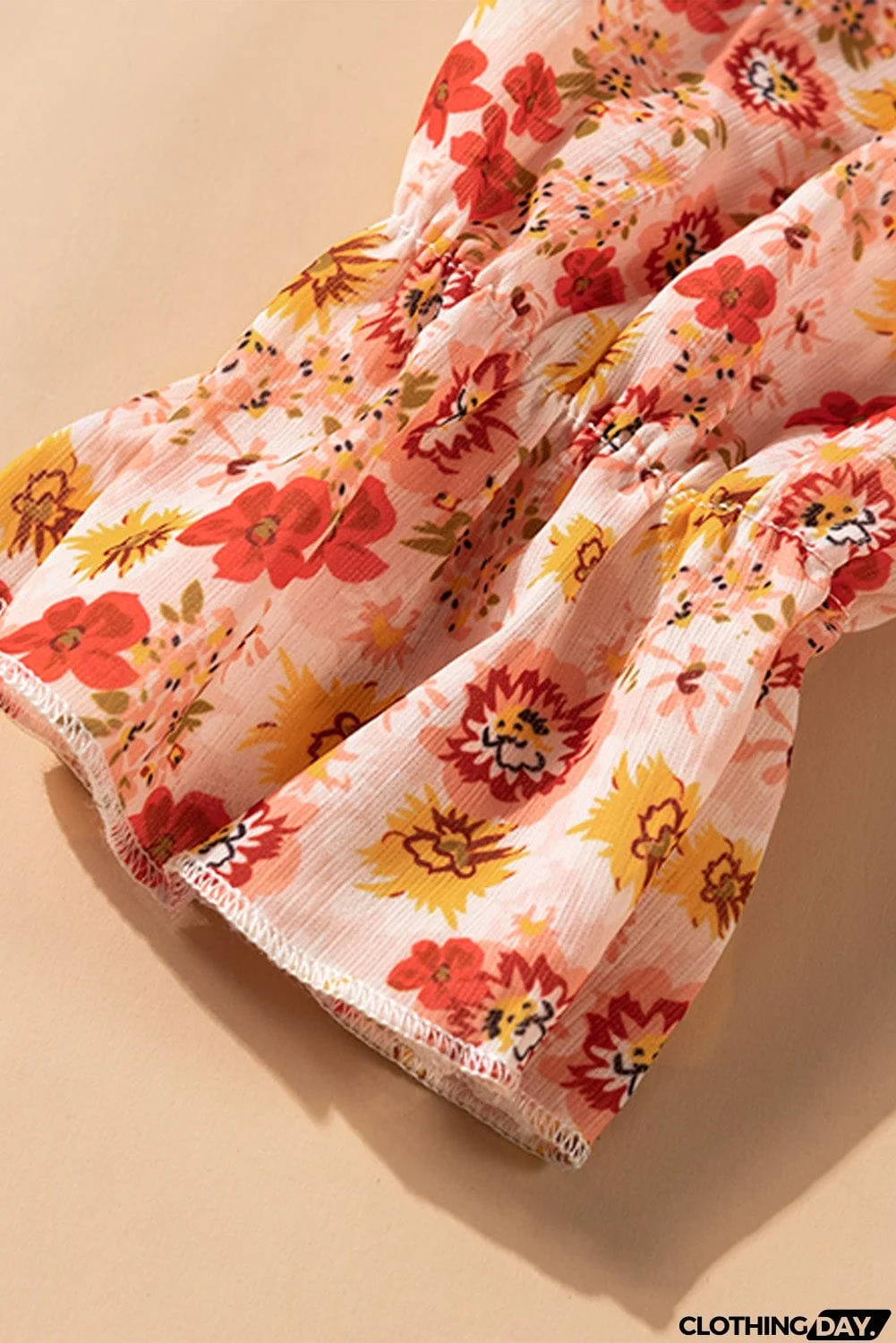 Orange Floral Peplum Blouse