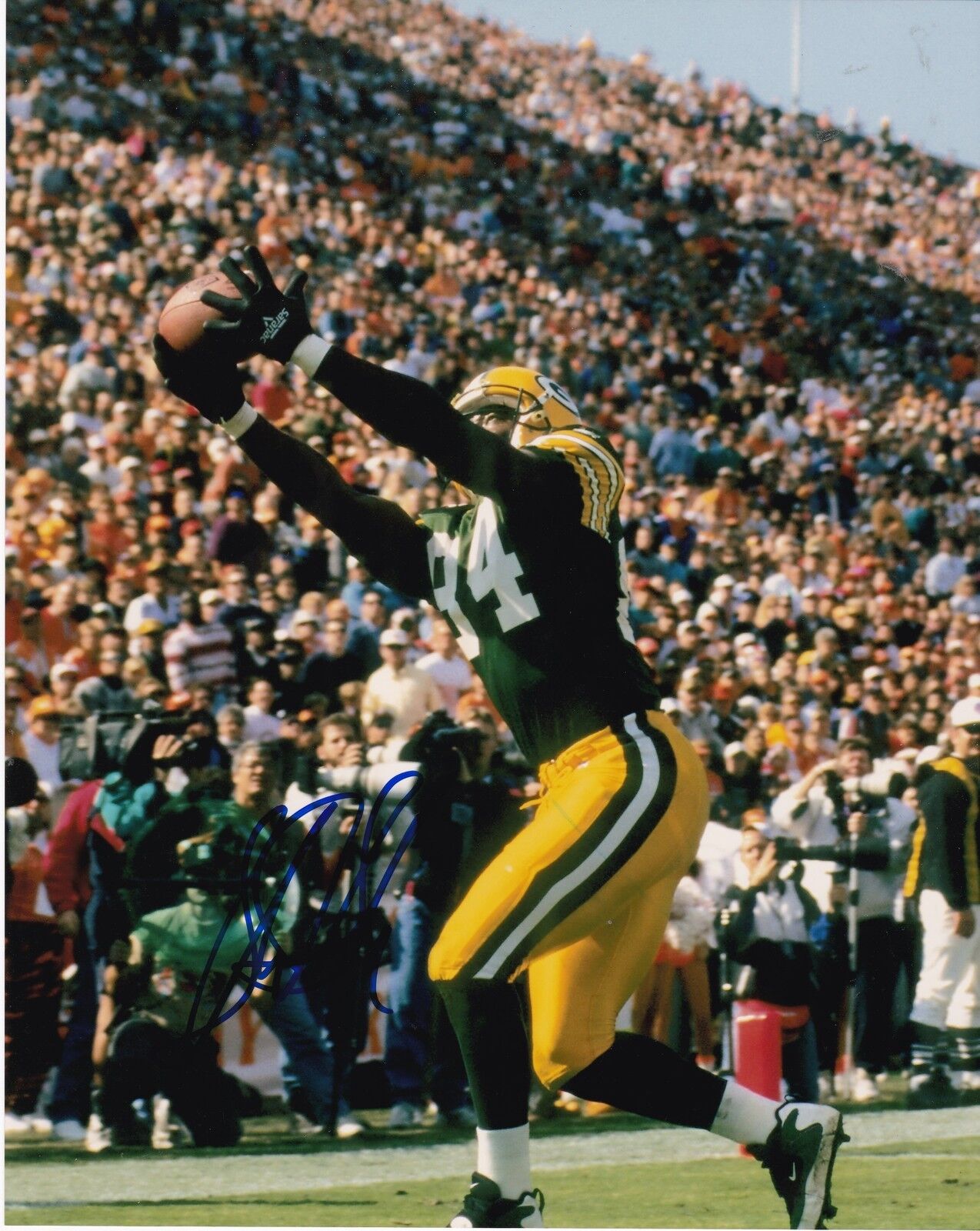 STERLING SHARPE GREEN BAY PACKERS ACTION SIGNED 8x10