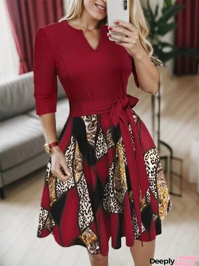 Plus Size Printed Tie Front Notched Long Sleeve Dress