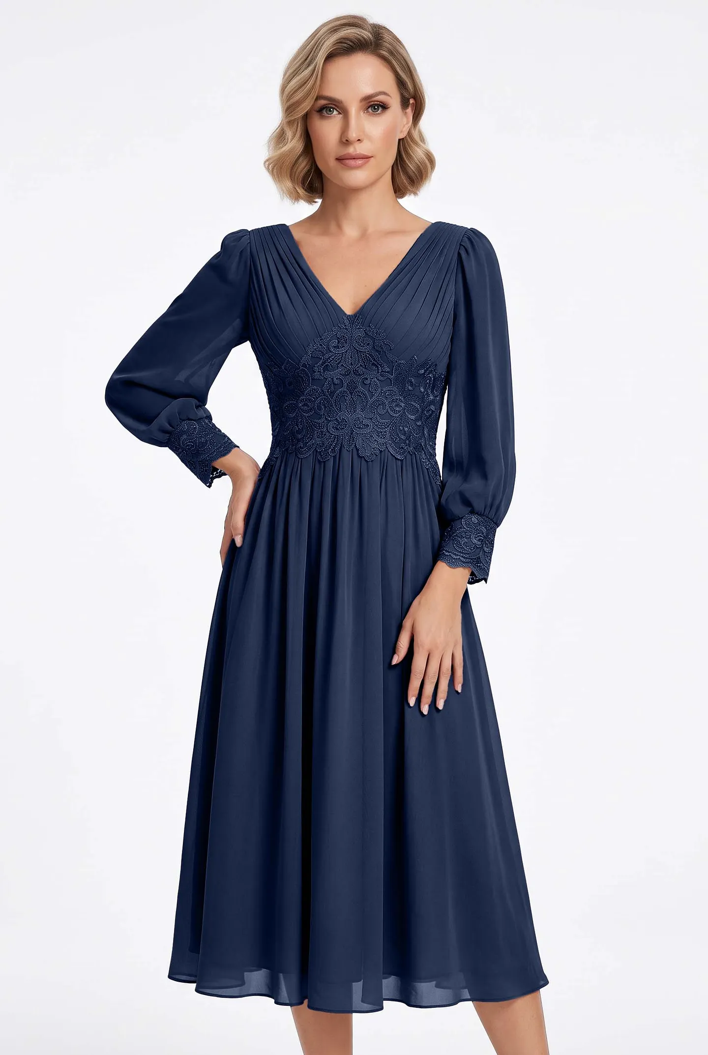 Woman in a navy chiffon pleated midi dress