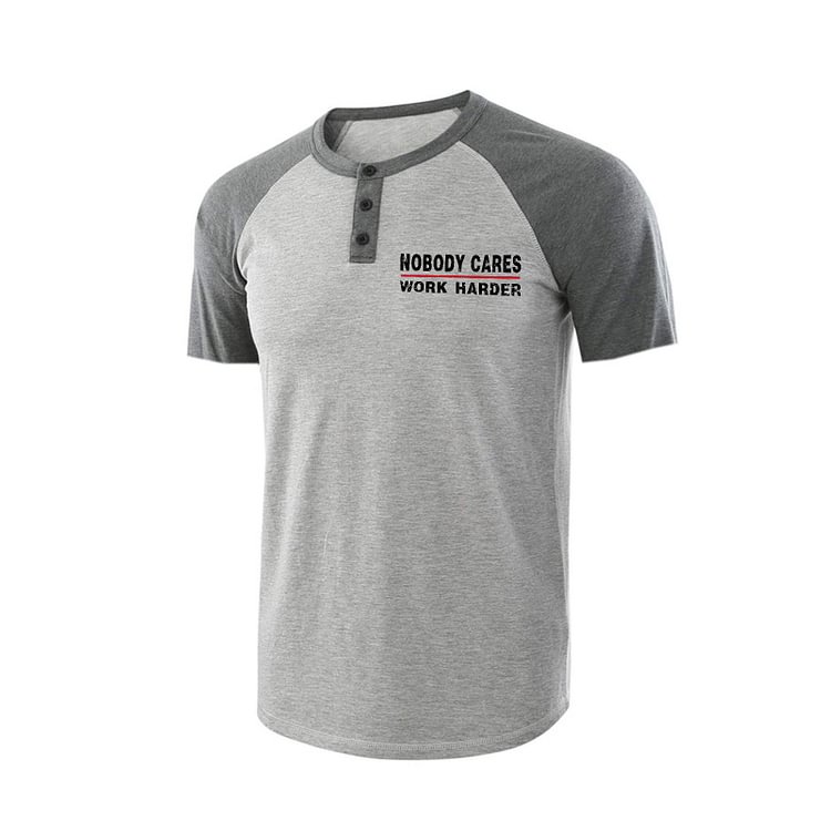 NOBODY CARES WORK HARDER HENLEY NECK RAGLAN GRAPHIC TEE