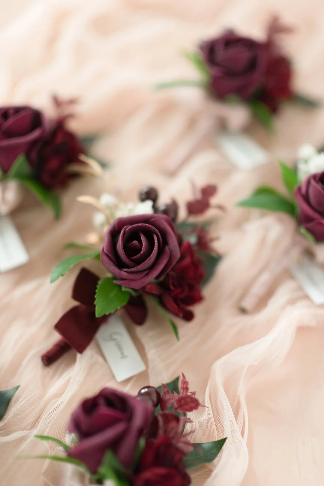 Boutonnieres in Classic Marsala