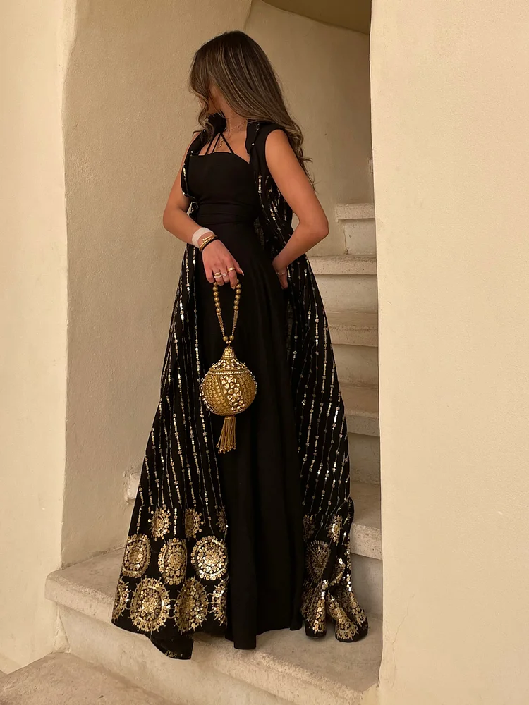 Black sling dress + sequin embroidered sleeveless cardigan فساتين