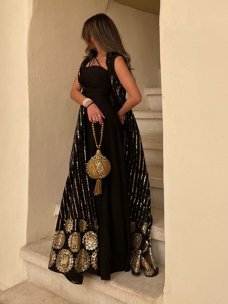 Black sling dress + sequin embroidered sleeveless cardigan فساتين