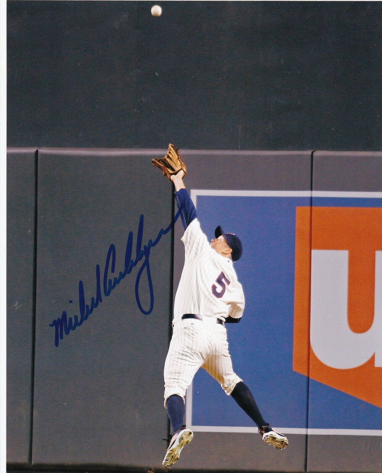 MICHAEL CUDDYER MINNESOTA TWINS ACTION SIGNED 8x10