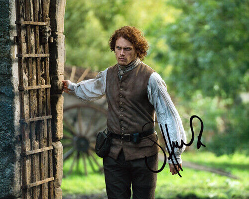 Autographed Photo Poster painting Sam Heughan Signed 8 x 10